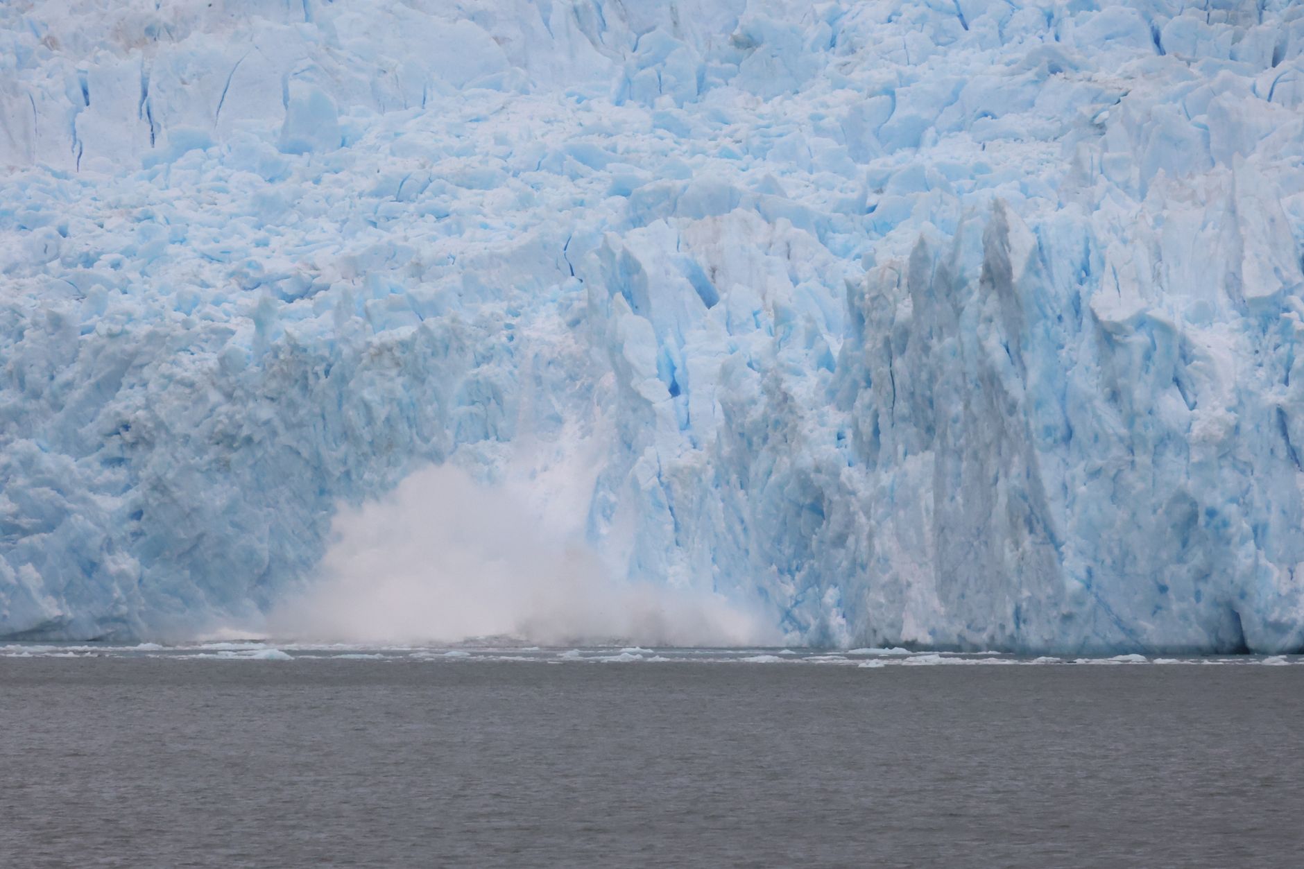 Patagonian turquoise lake and massive glacier face